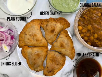 assembling the samosa chaat