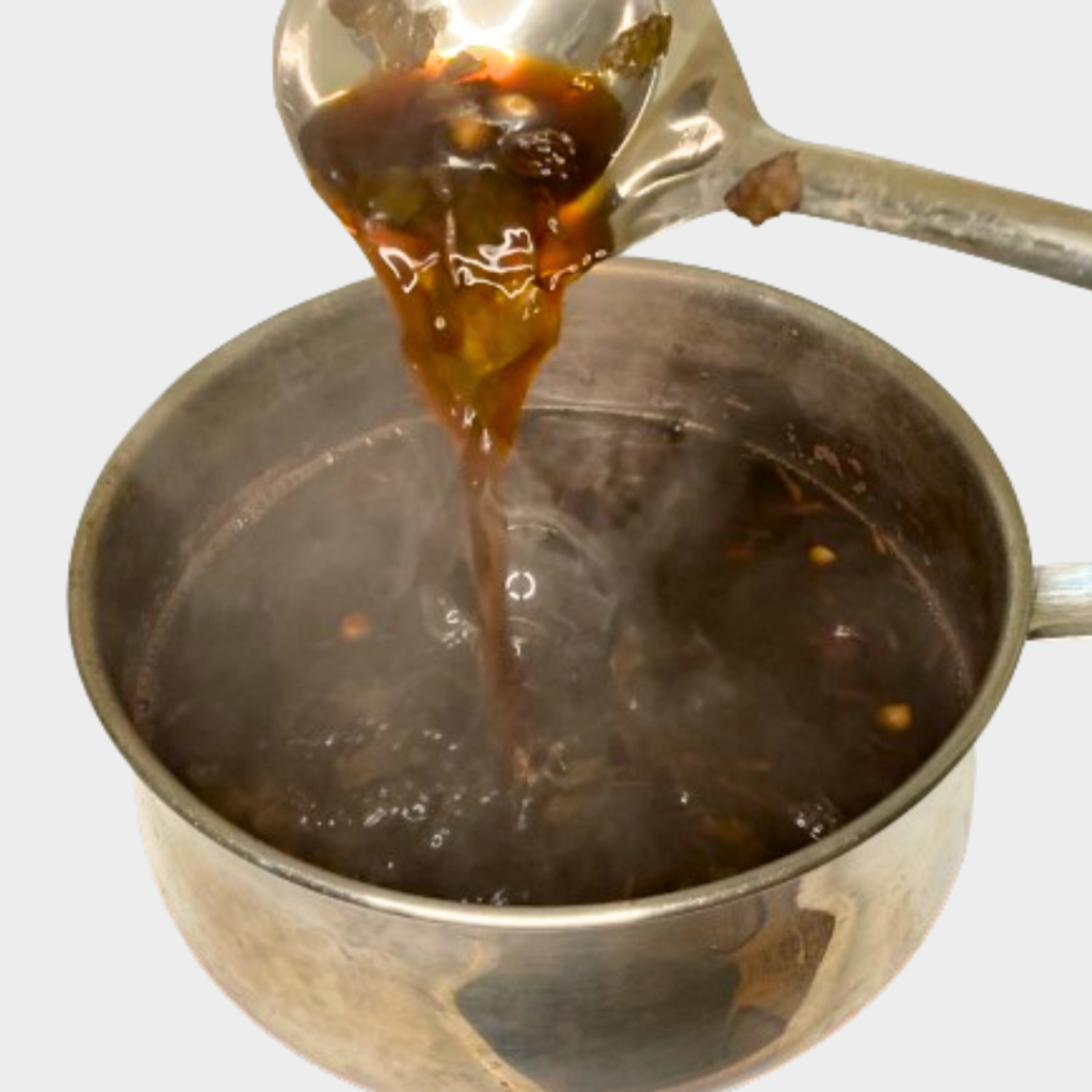 stir pink tea in upward motion to release colour