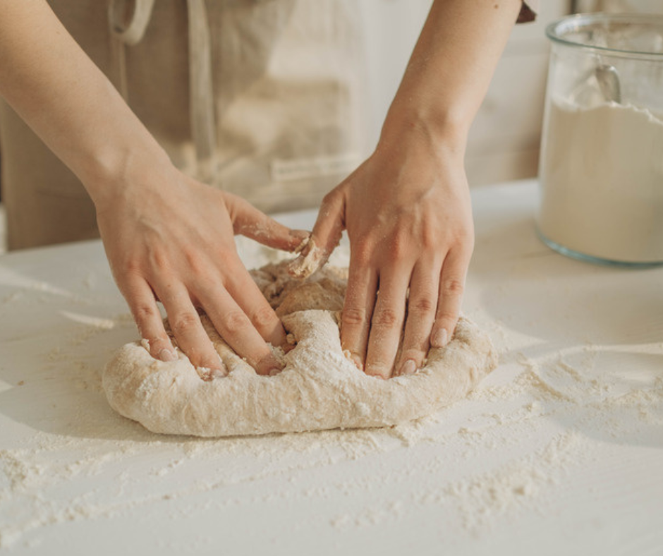 Knead the dough for pizza
