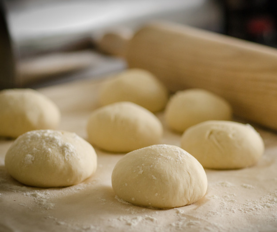 Make the pizza dough into equal balls and roll them into thick flat circles