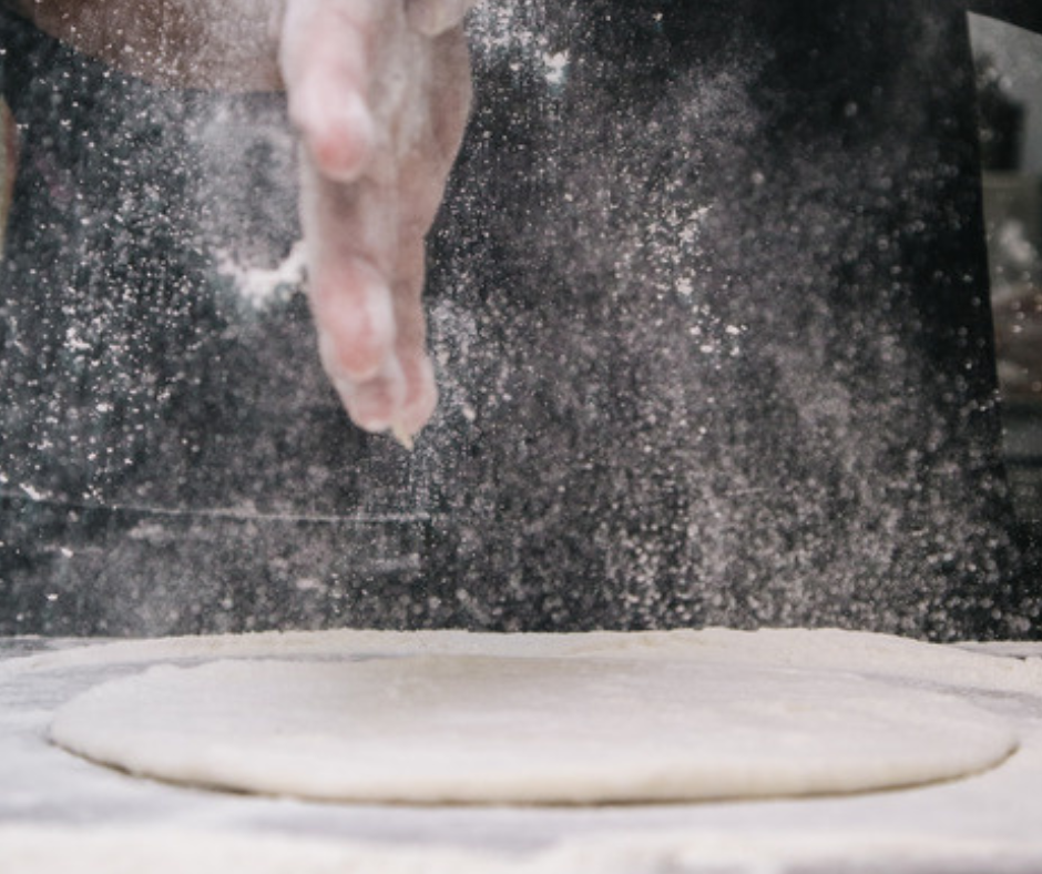 Roll the dough flat for Mini Pizzas